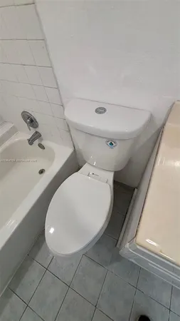 a bathroom with a shower and a bathtub