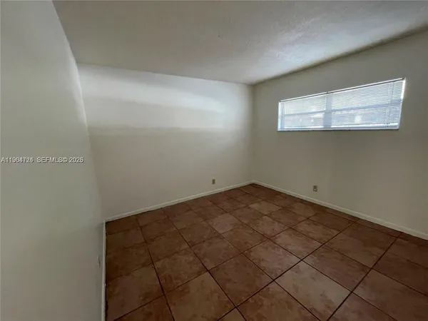 a view of a big room with wooden floor