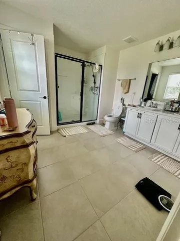 a view of a storage & utility room with a sink
