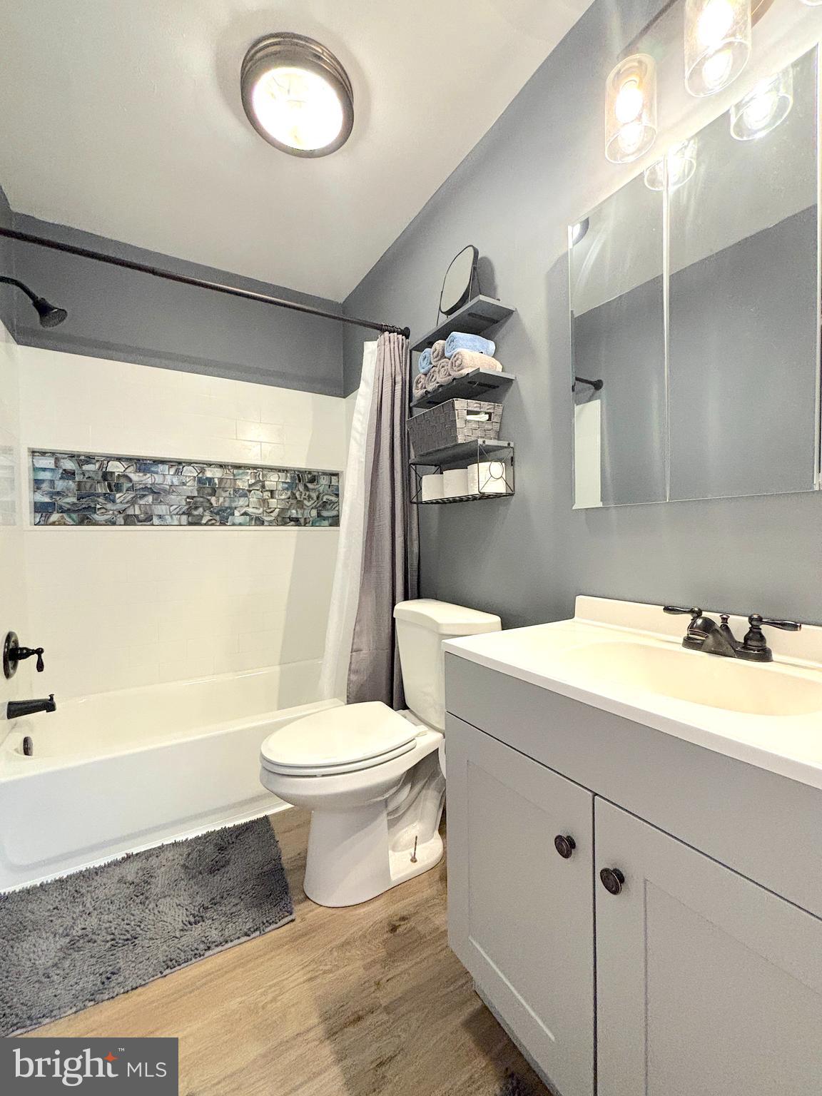 26 Noble Road Sicklerville, NJ 08081 - Photo 20 of 33 a bathroom with a sink a toilet and shower