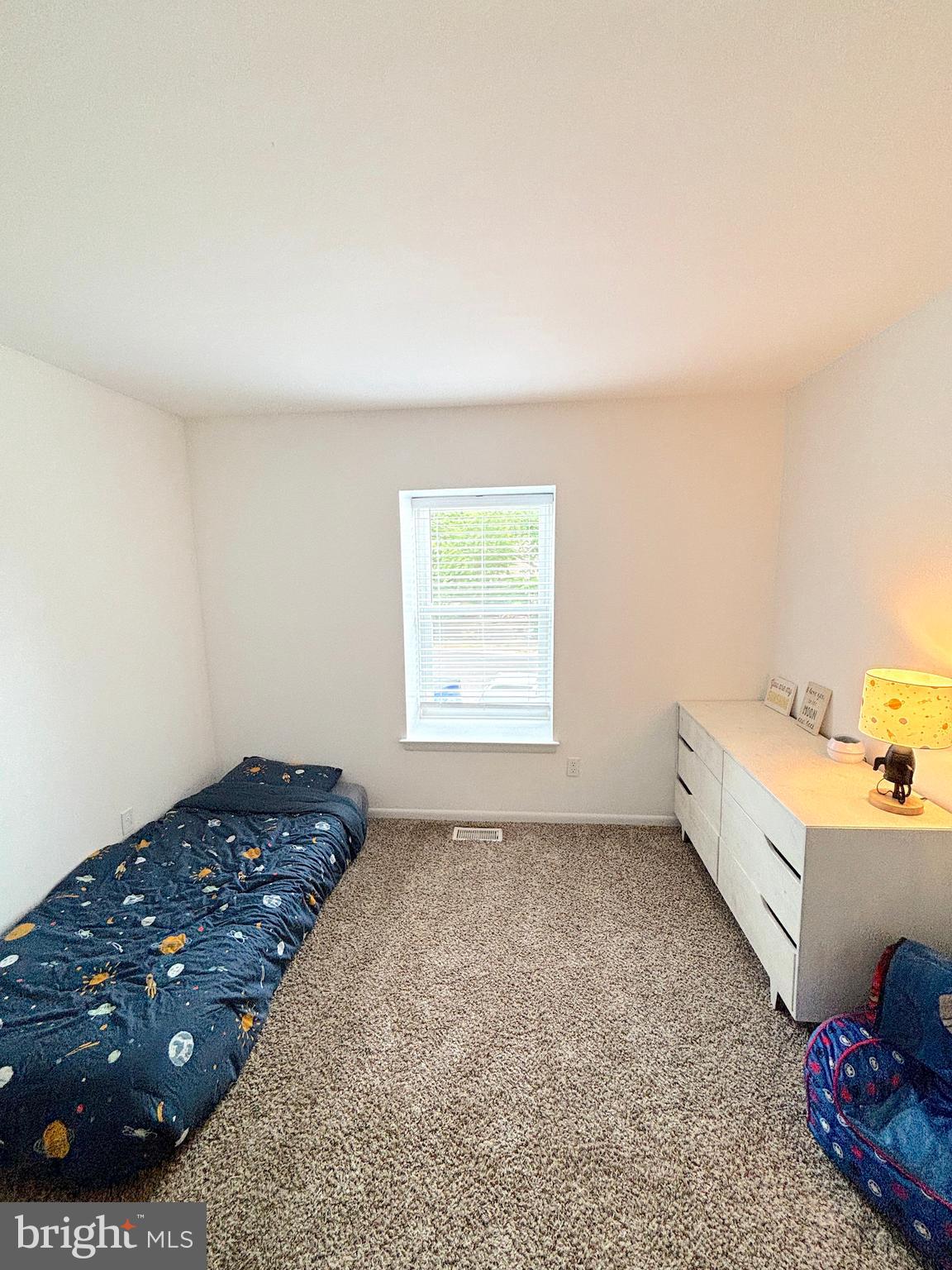26 Noble Road Sicklerville, NJ 08081 - Photo 25 of 33 a spacious bedroom with a bed and a window