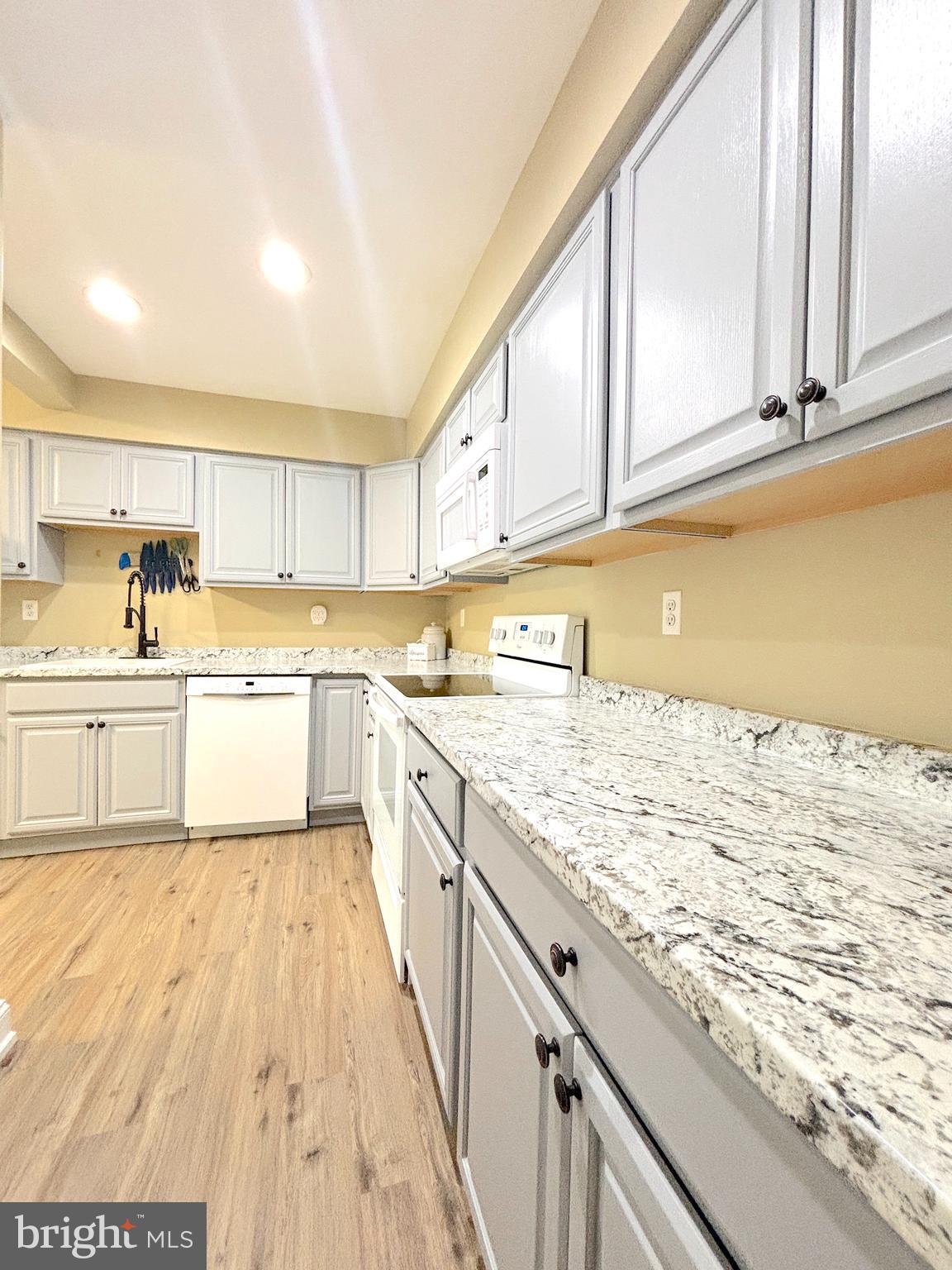 26 Noble Road Sicklerville, NJ 08081 - Photo 3 of 33 a large kitchen with cabinets