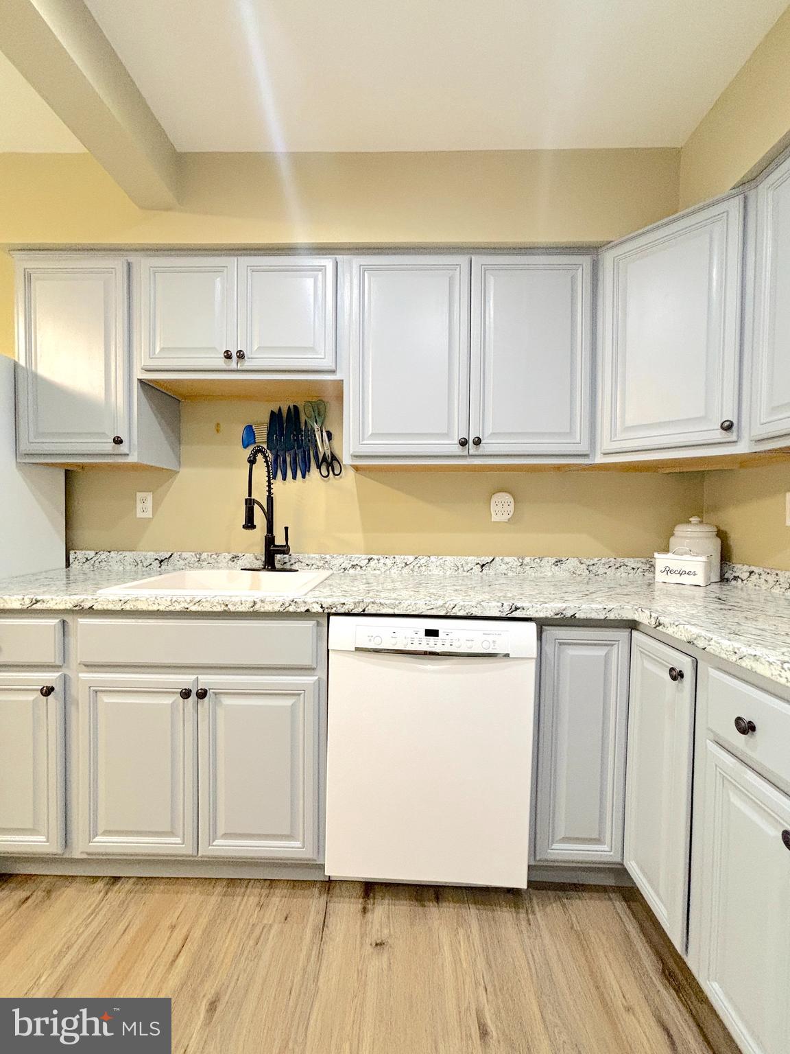 26 Noble Road Sicklerville, NJ 08081 - Photo 7 of 33 a kitchen with granite countertop a sink and cabinets