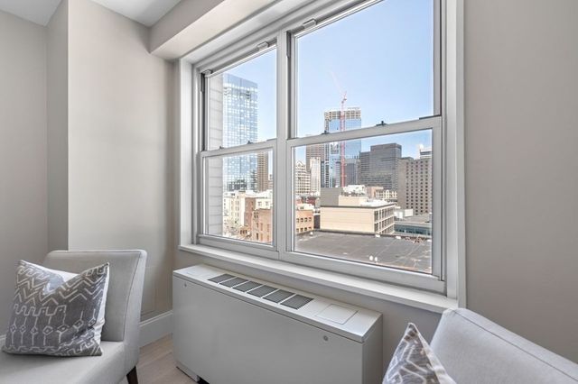 a view of a living room and a window
