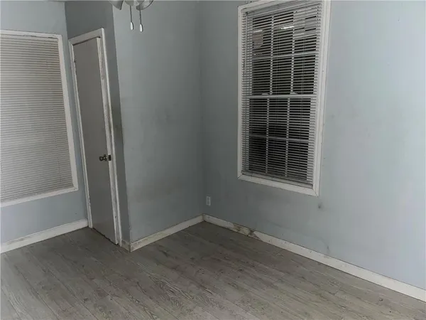 an empty room with windows