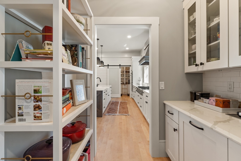 1102 Massachusetts Avenue Lexington, MA 02421 - Photo 13 of 42 a view of a kitchen and utility room