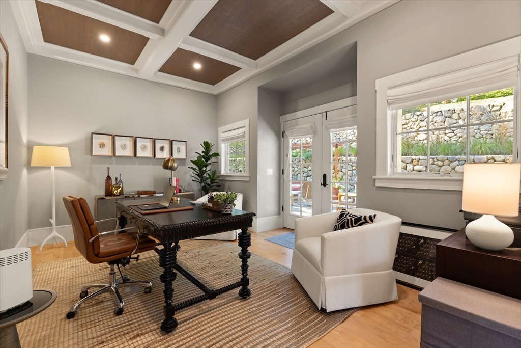 1102 Massachusetts Avenue Lexington, MA 02421 - Photo 17 of 42 a living room with furniture and a window