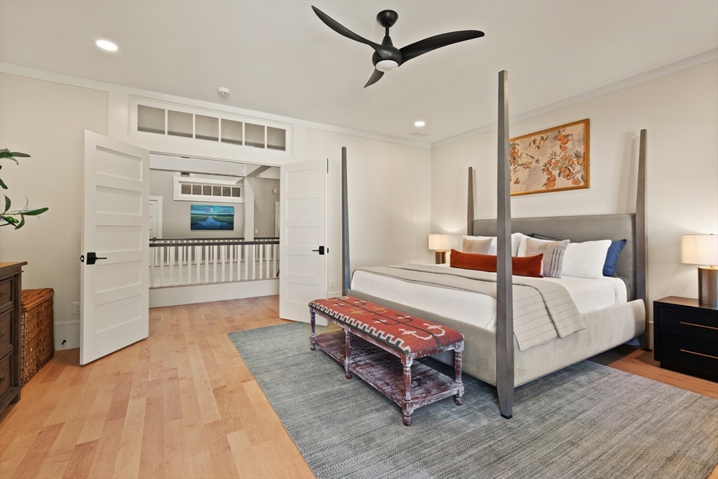 1102 Massachusetts Avenue Lexington, MA 02421 - Photo 21 of 42 a room with a bed window and a table