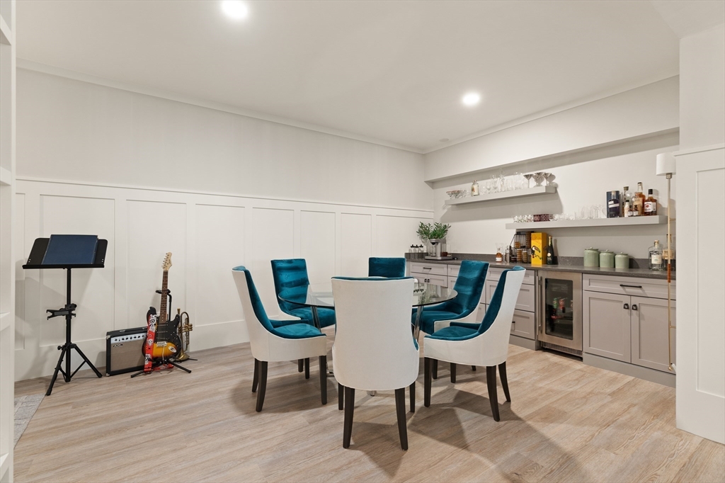 1102 Massachusetts Avenue Lexington, MA 02421 - Photo 33 of 42 a view of a dining room with furniture and wooden floor