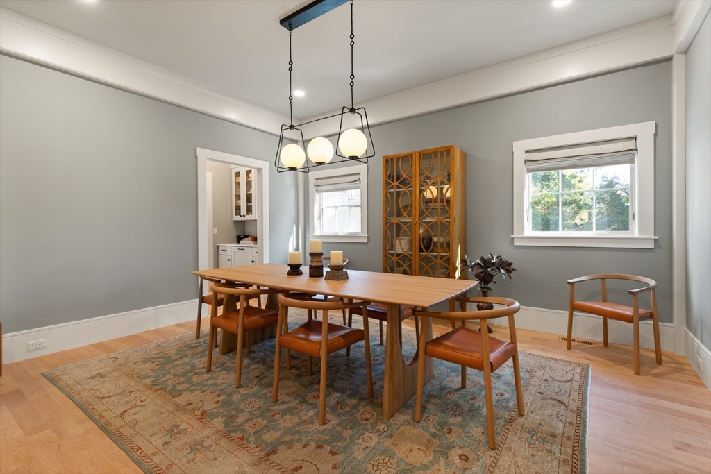 1102 Massachusetts Avenue Lexington, MA 02421 - Photo 10 of 42 a view of a dining room with furniture window and wooden floor