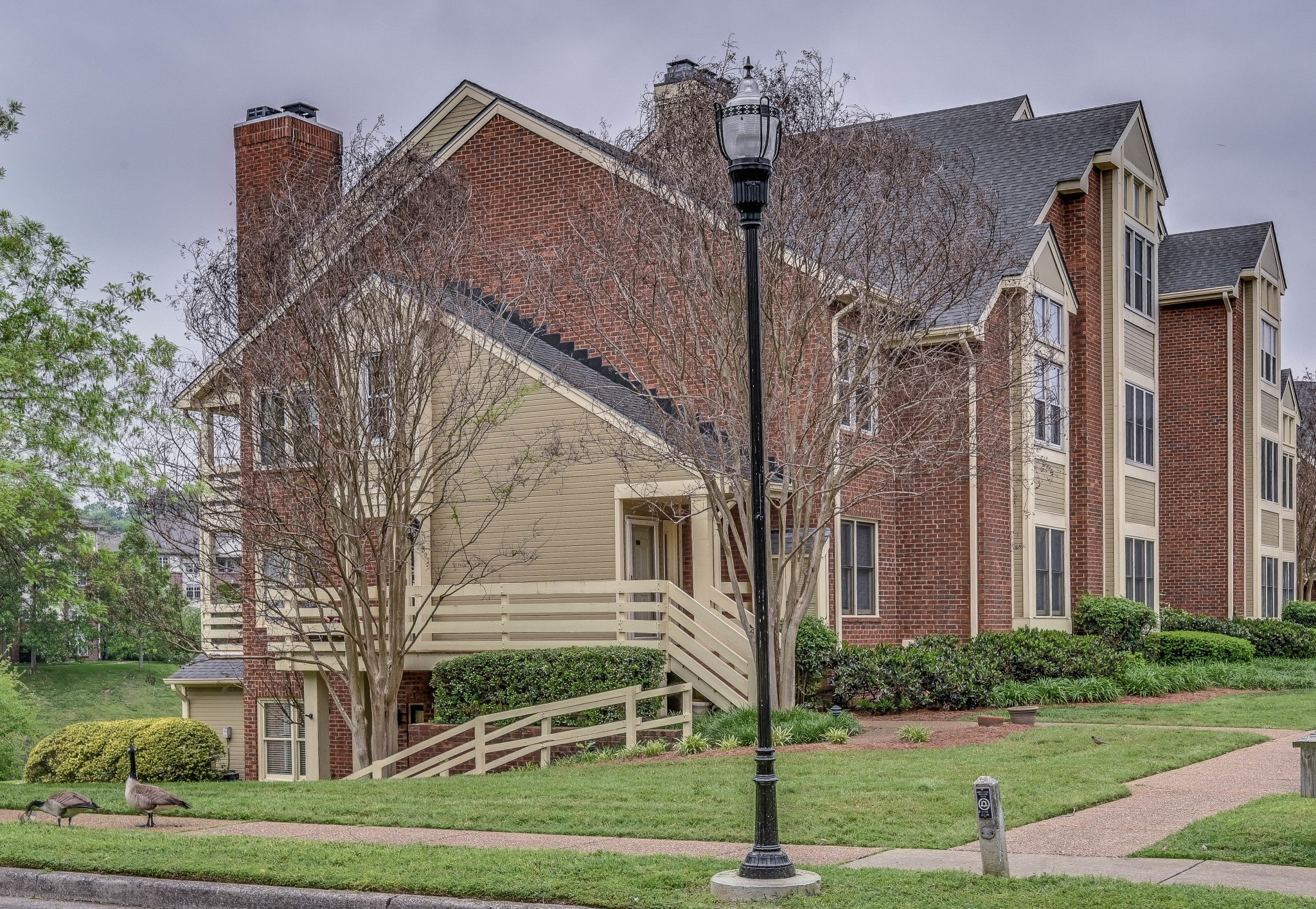 301 Boxmere Place Nashville, TN 37215 - Photo 2 of 40 a view of a white house next to a yard