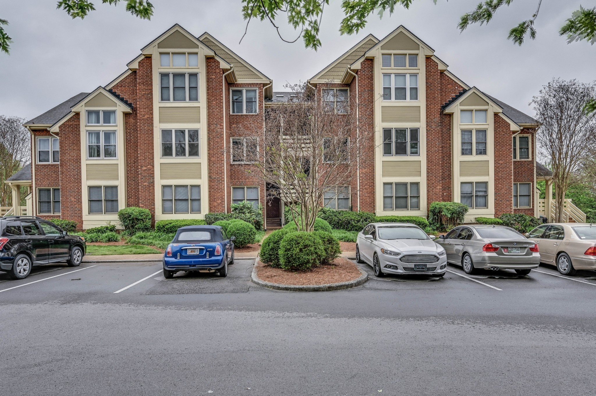 301 Boxmere Place Nashville, TN 37215 - Photo 3 of 40 a car parked in front of a house