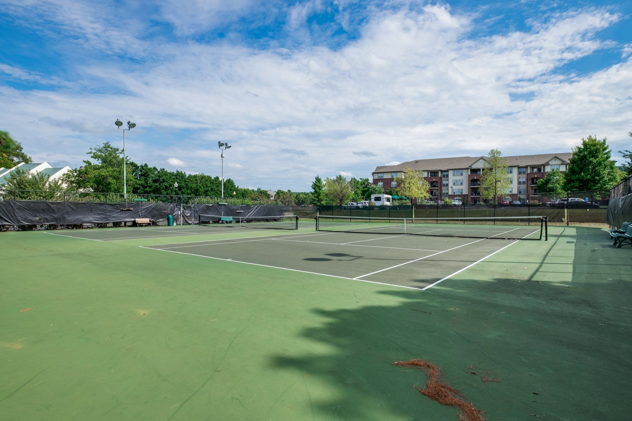 301 Boxmere Place Nashville, TN 37215 - Photo 5 of 40 a view of a tennis ground with large trees