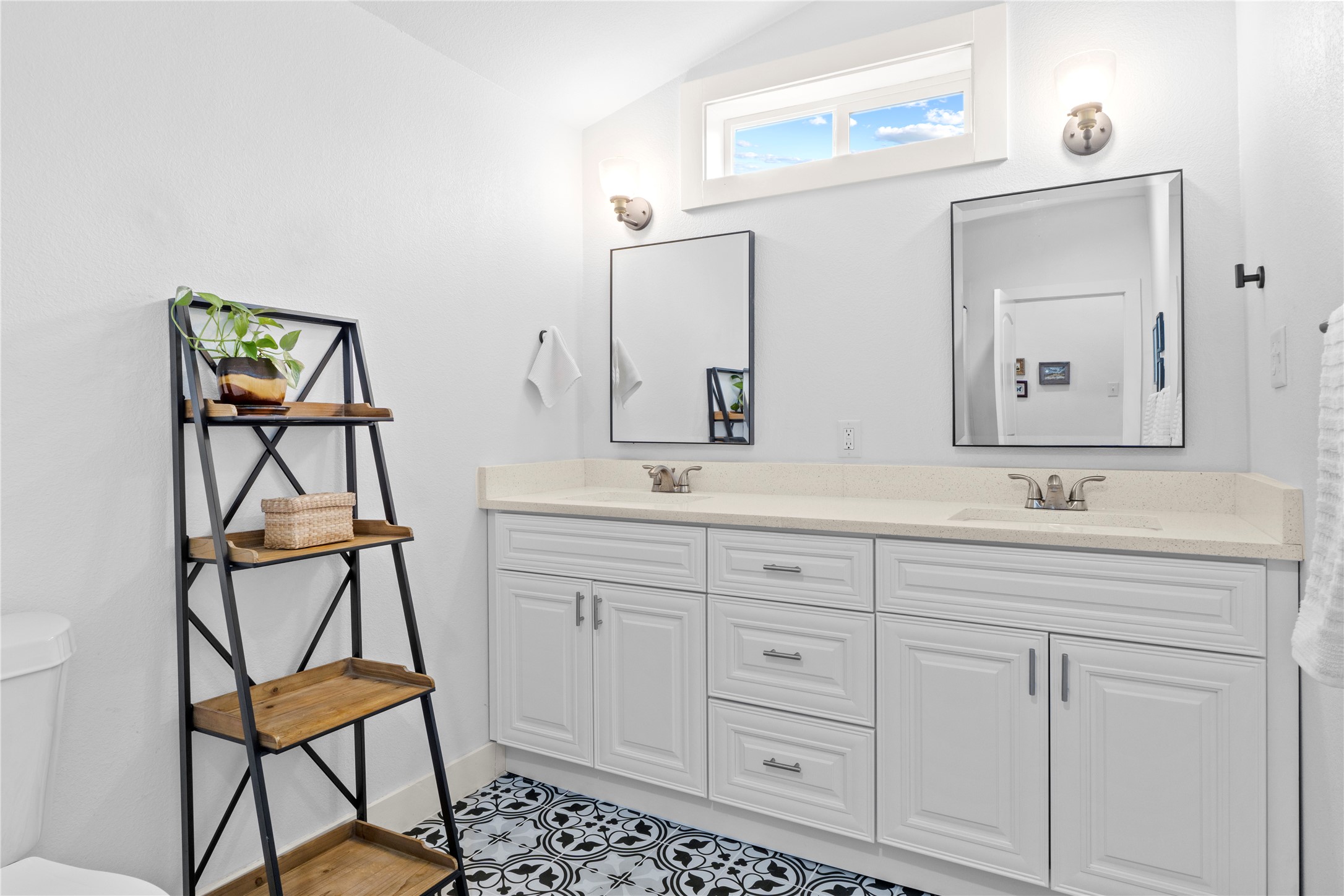 1120 Vance Street Taylor, TX 76574 - Photo 19 of 40 Two sink vanity and full bathtub in bathroom.