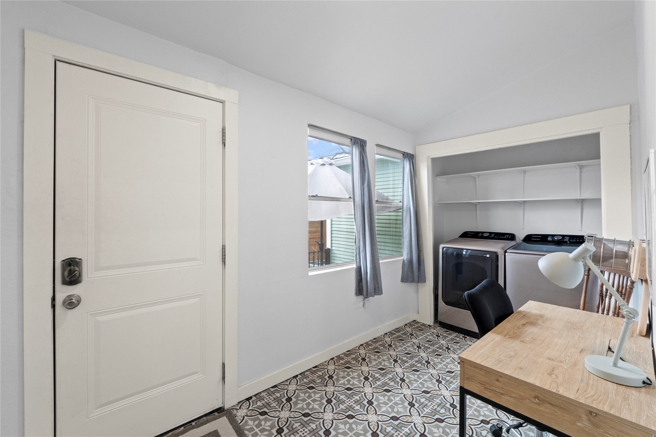 1120 Vance Street Taylor, TX 76574 - Photo 22 of 40 Current owner uses this HUGE laundry room as an office.