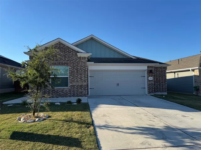 a front view of house with yard