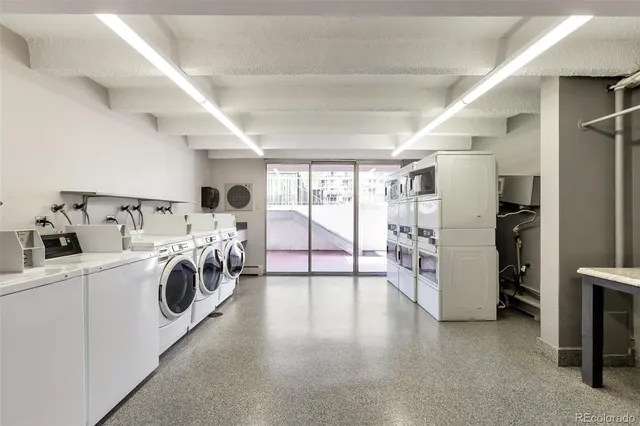 a view of a storage & utility room with washer and dryer