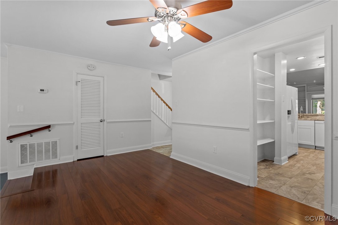 11905 West Briar Patch Drive Midlothian, VA 23113 - Photo 14 of 49 LVP flooring and celiling fan in the dining room
