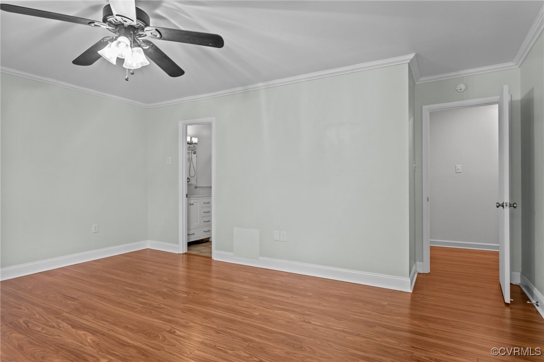 11905 West Briar Patch Drive Midlothian, VA 23113 - Photo 29 of 49 LVP flooring and ceiling fan in primary bedroom