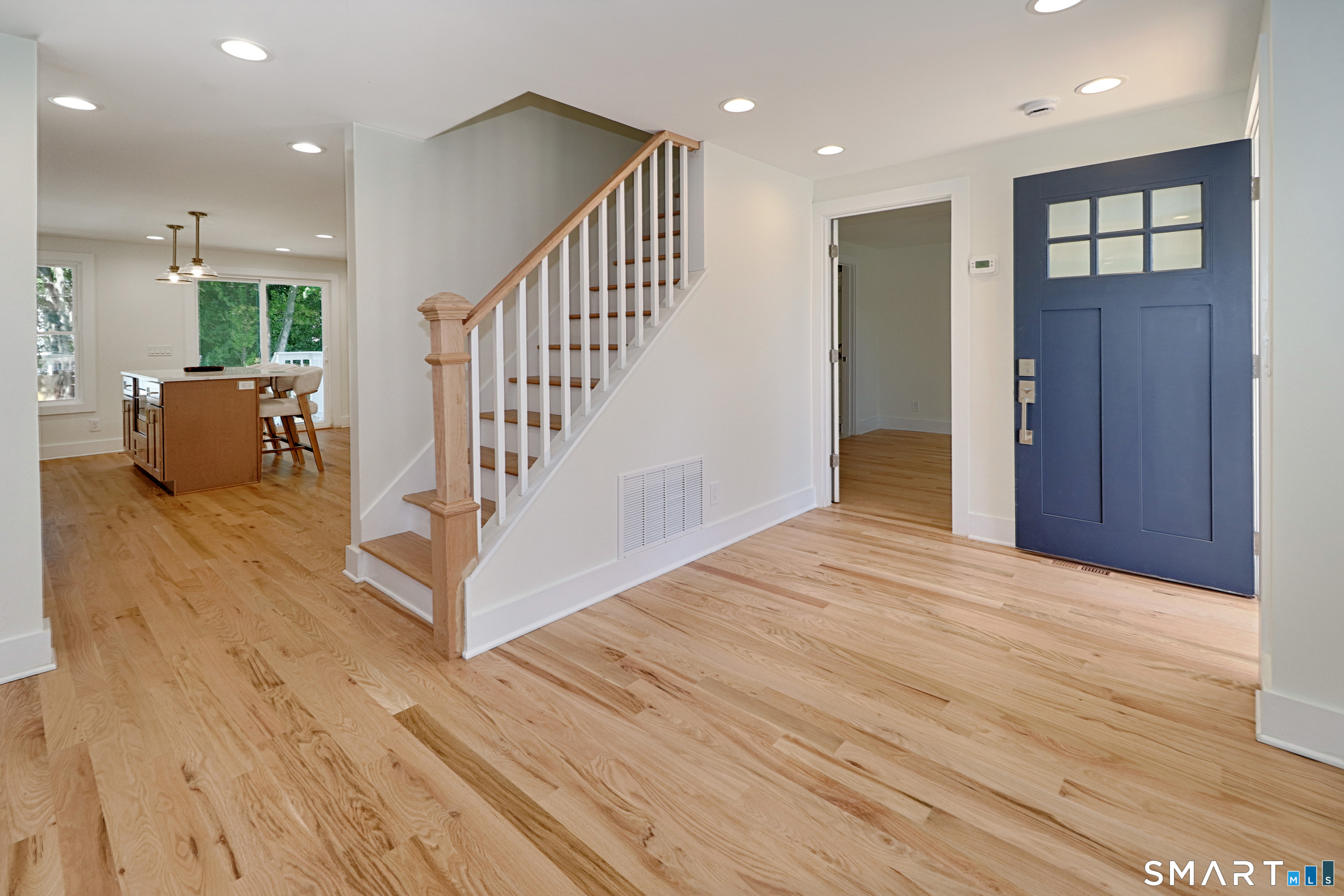 148 Ridgely Avenue Fairfield, CT 06825 - Photo 7 of 37 Dining Room To Kitchen And Primary Bedroom