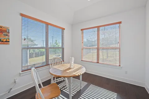 a kitchen with stainless steel appliances a sink a stove top oven a counter space and cabinets