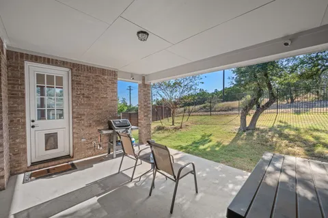 a view of storage and utility room with washer and dryer