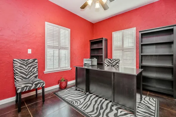 a room with furniture and a window