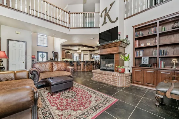 a living room with furniture and a rug