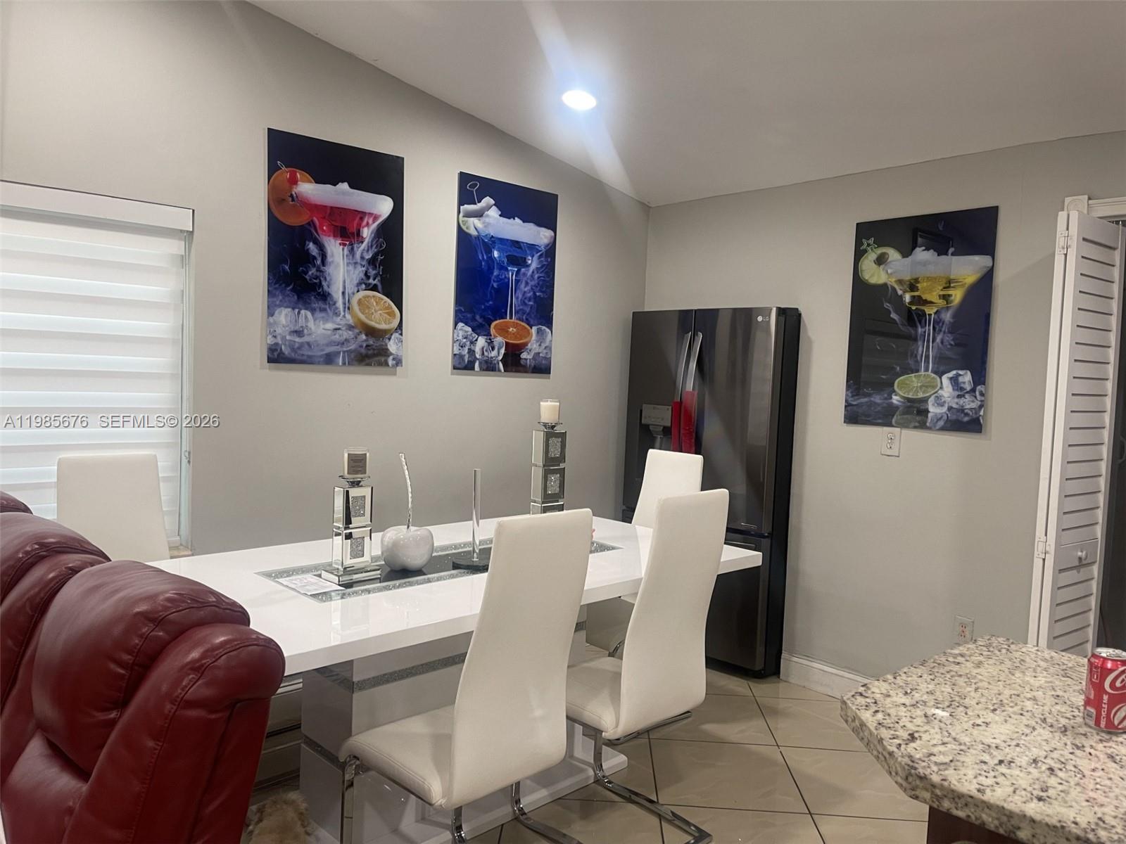 3115 Northwest 86th Street Miami, FL 33147 - Photo 2 of 4 a view of a dining room with furniture