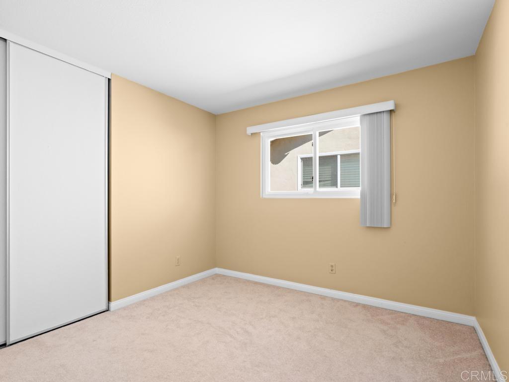 10020 Stanley Court Santee, CA 92071 - Photo 14 of 27 a view of an empty room with a window