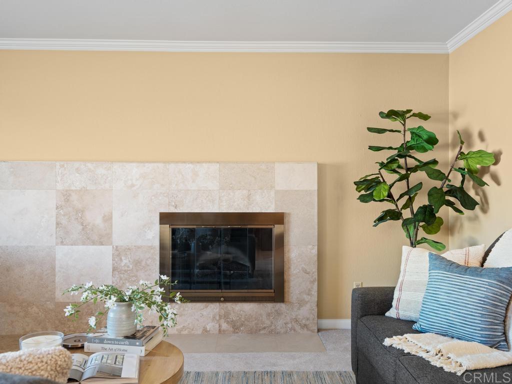 10020 Stanley Court Santee, CA 92071 - Photo 4 of 27 a living room with furniture and a potted plant