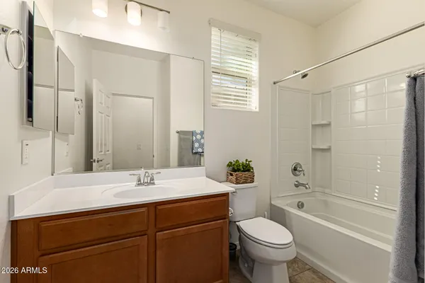 a bathroom with a sink a toilet and a bathtub