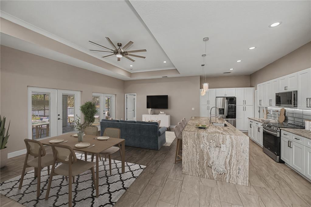 159 April Road Rotonda West, FL 33947 - Photo 12 of 73 a view of a dining room with furniture