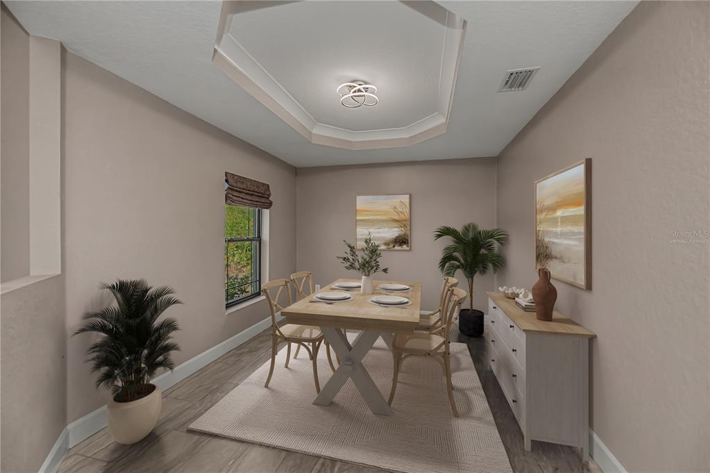 159 April Road Rotonda West, FL 33947 - Photo 25 of 73 a view of a dining room with furniture and window