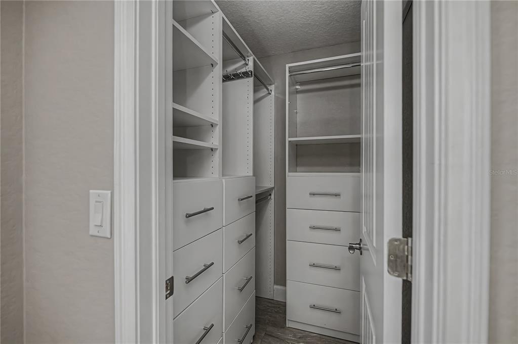 159 April Road Rotonda West, FL 33947 - Photo 32 of 73 a view of walk in closet
