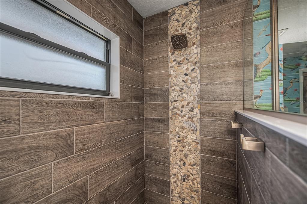 159 April Road Rotonda West, FL 33947 - Photo 37 of 73 a bathroom with a shower