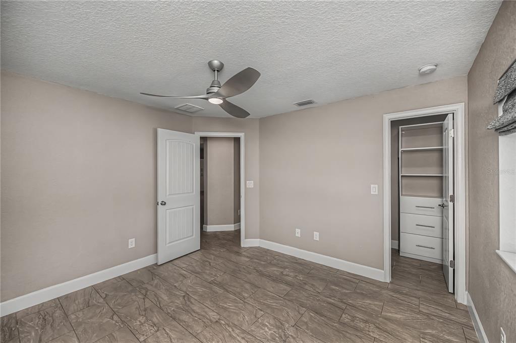 159 April Road Rotonda West, FL 33947 - Photo 40 of 73 a view of an empty room and closet area