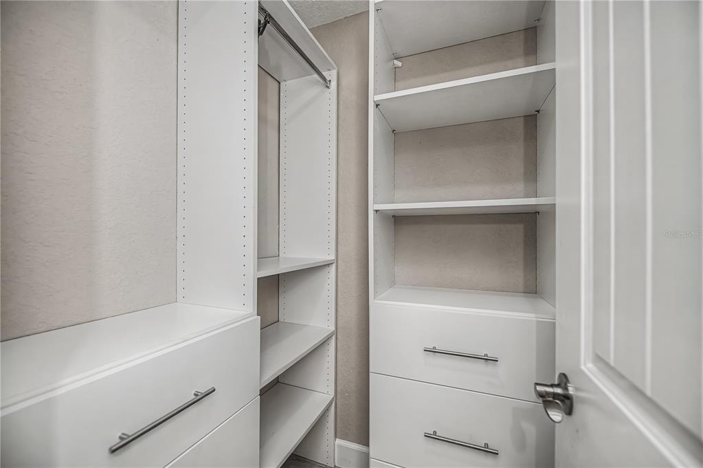 159 April Road Rotonda West, FL 33947 - Photo 41 of 73 a view of an empty walk in closet