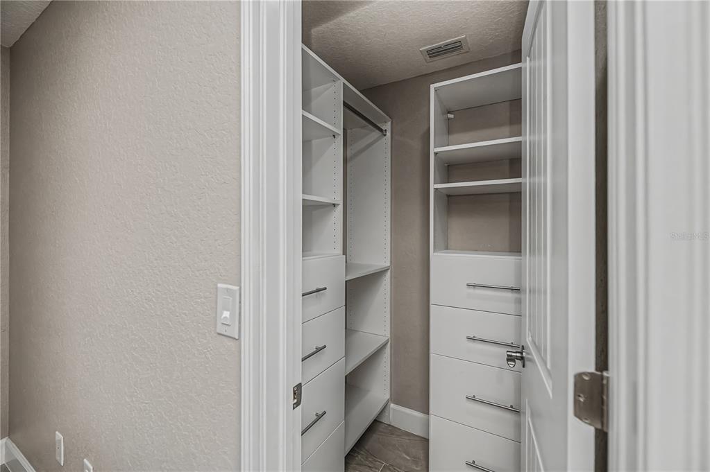 159 April Road Rotonda West, FL 33947 - Photo 45 of 73 a view of walk in closet