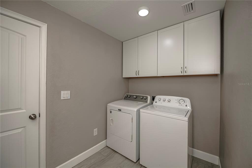 159 April Road Rotonda West, FL 33947 - Photo 46 of 73 a utility room with dryer and washer