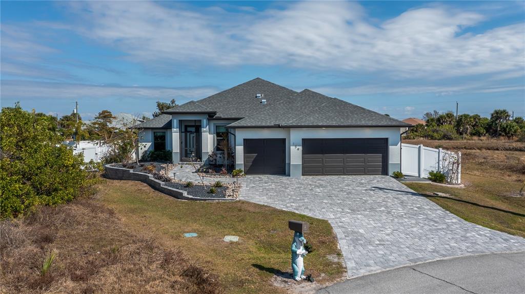 159 April Road Rotonda West, FL 33947 - Photo 64 of 73 a front view of a house with sitting area