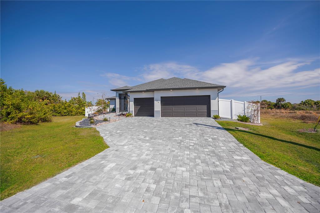 159 April Road Rotonda West, FL 33947 - Photo 65 of 73 a front view of a house with ocean view