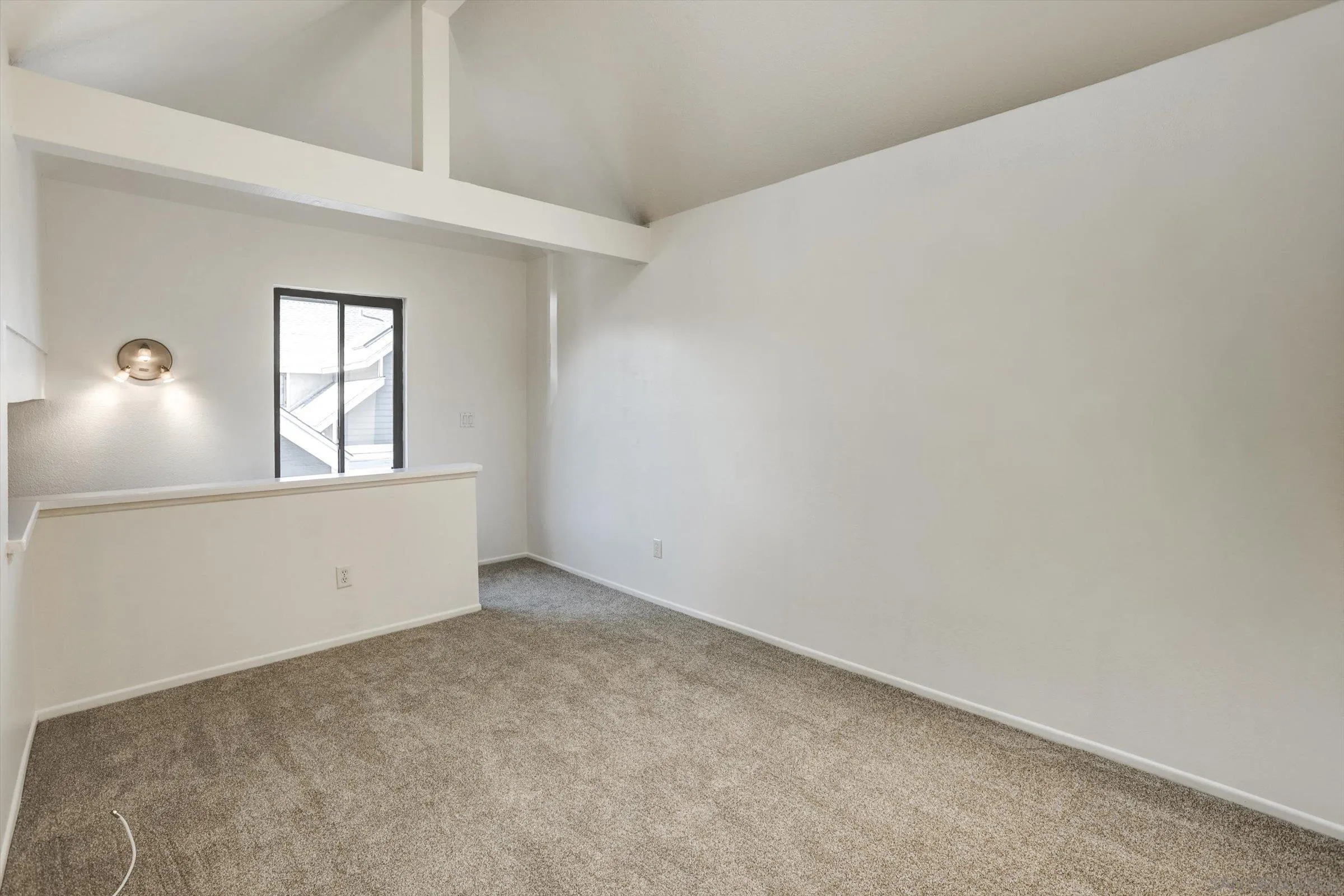 13230 Johannesberg Way, Unit 10 Poway, CA 92064 - Photo 17 of 40 a view of an empty room with window