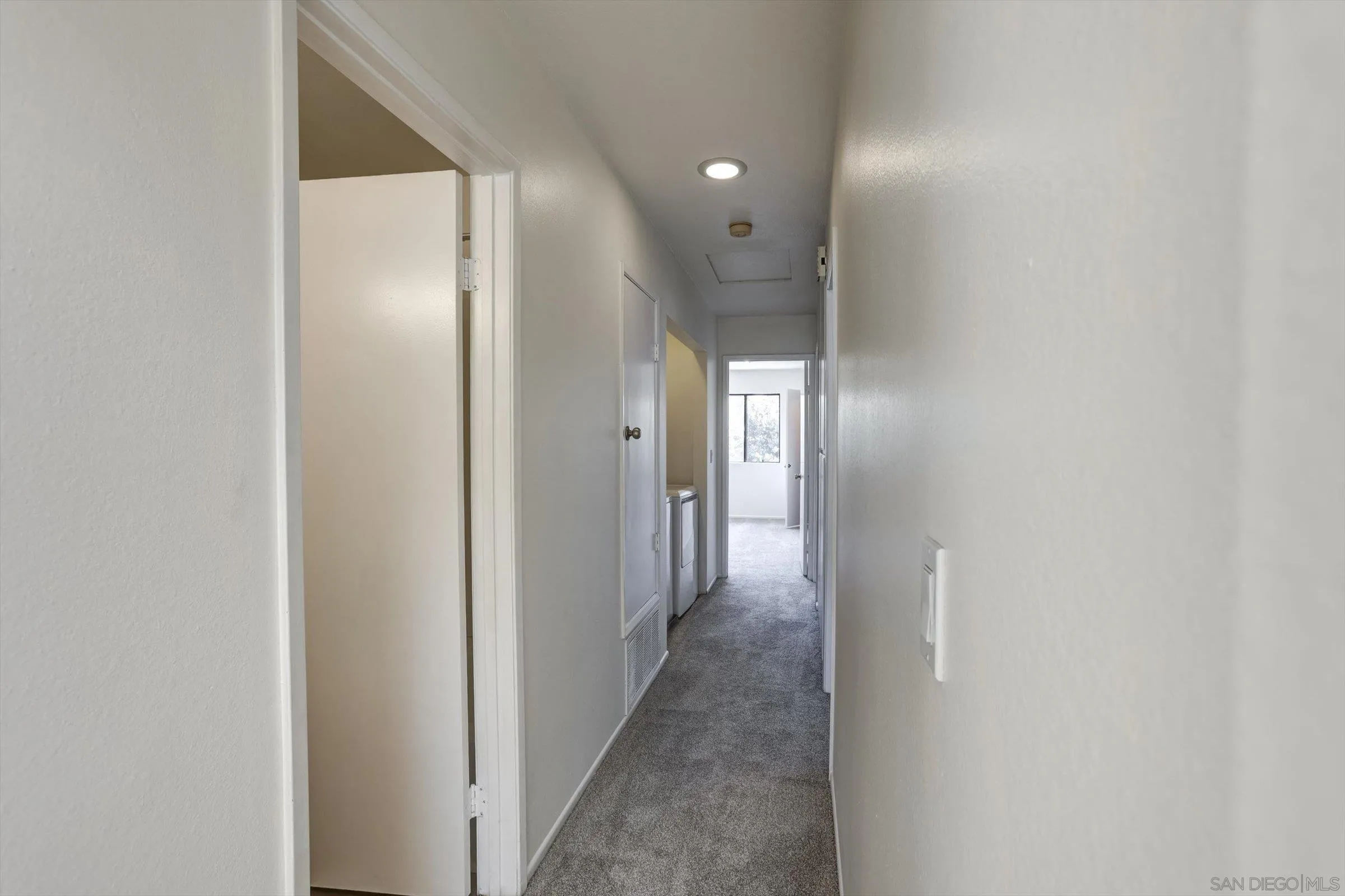 13230 Johannesberg Way, Unit 10 Poway, CA 92064 - Photo 20 of 40 a view of a hallway with a elevator
