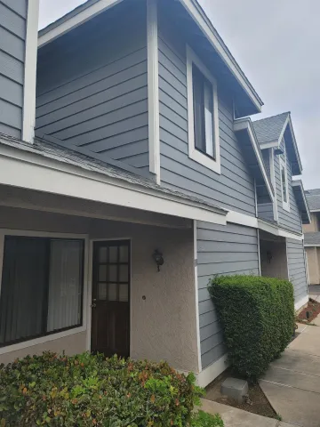 a front view of a house with garage