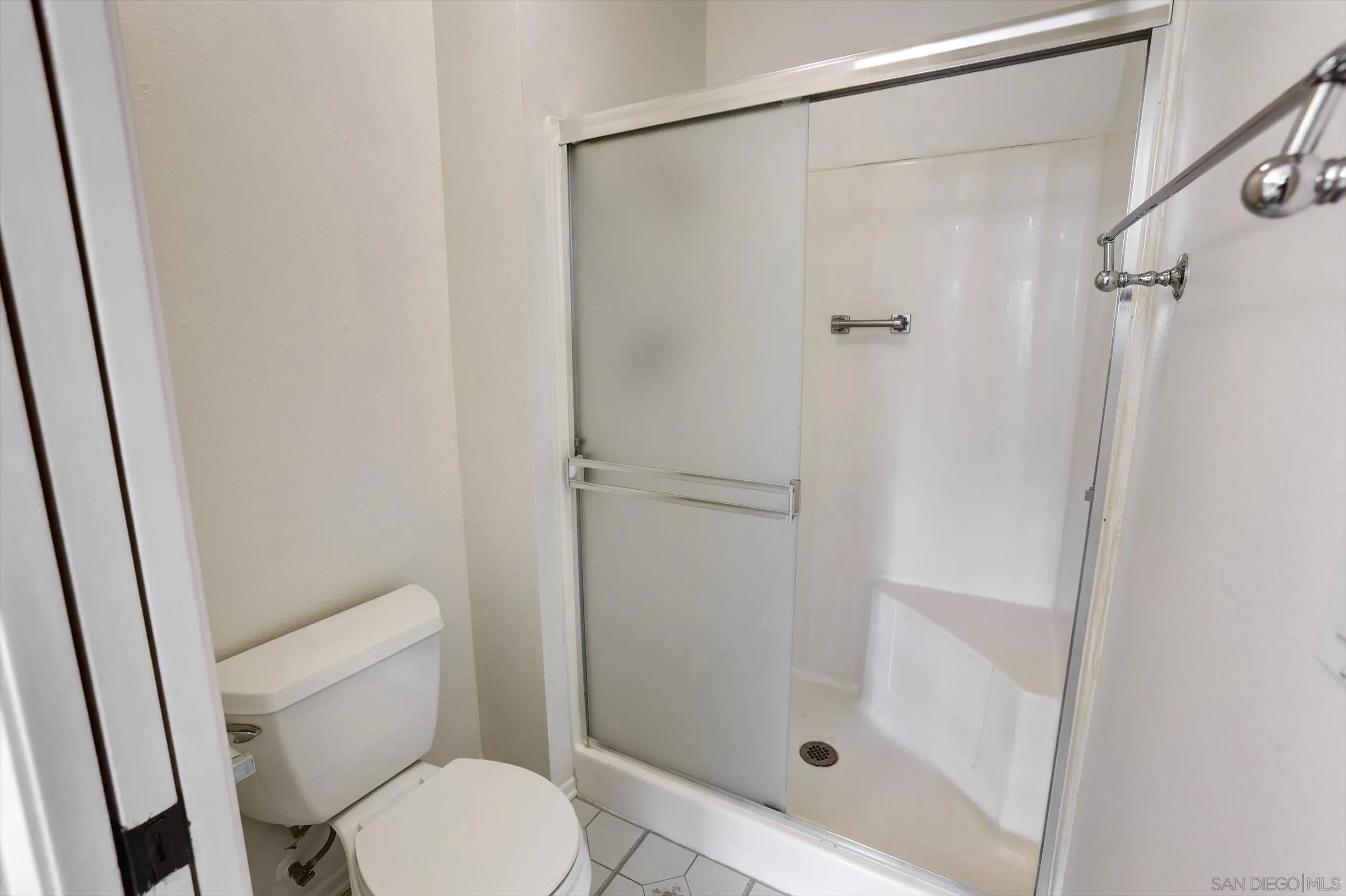 13230 Johannesberg Way, Unit 10 Poway, CA 92064 - Photo 29 of 40 a bathroom with a shower and a toilet