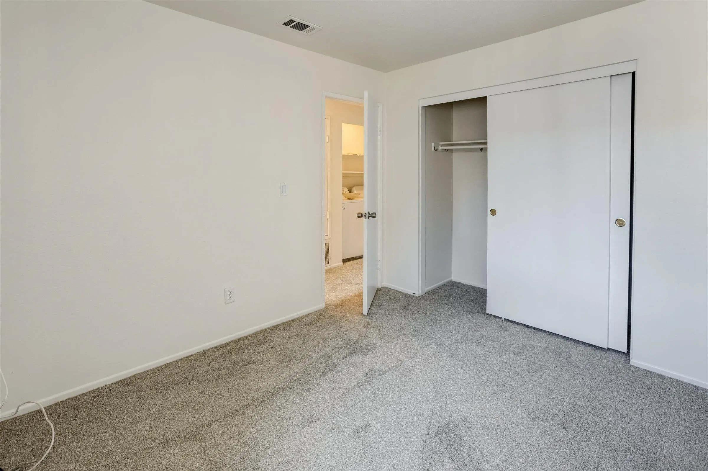 13230 Johannesberg Way, Unit 10 Poway, CA 92064 - Photo 31 of 40 a view of an empty room with closet and a window
