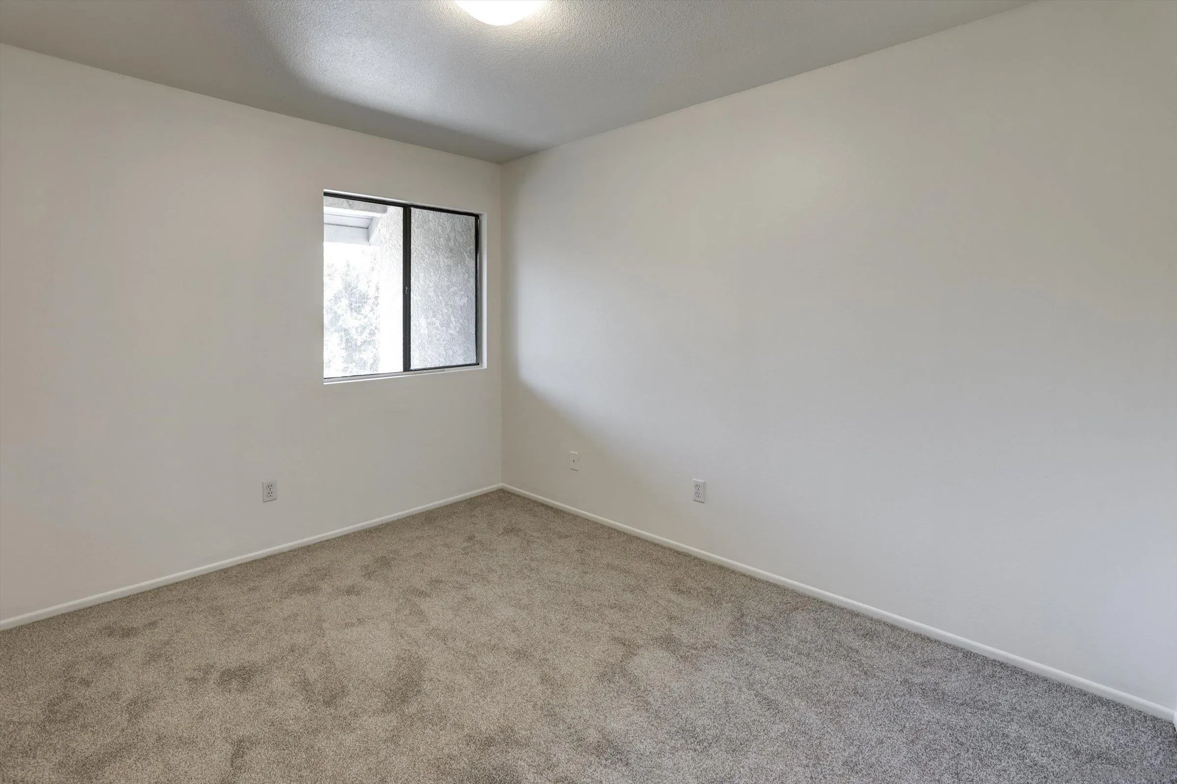 13230 Johannesberg Way, Unit 10 Poway, CA 92064 - Photo 33 of 40 an empty room with a window