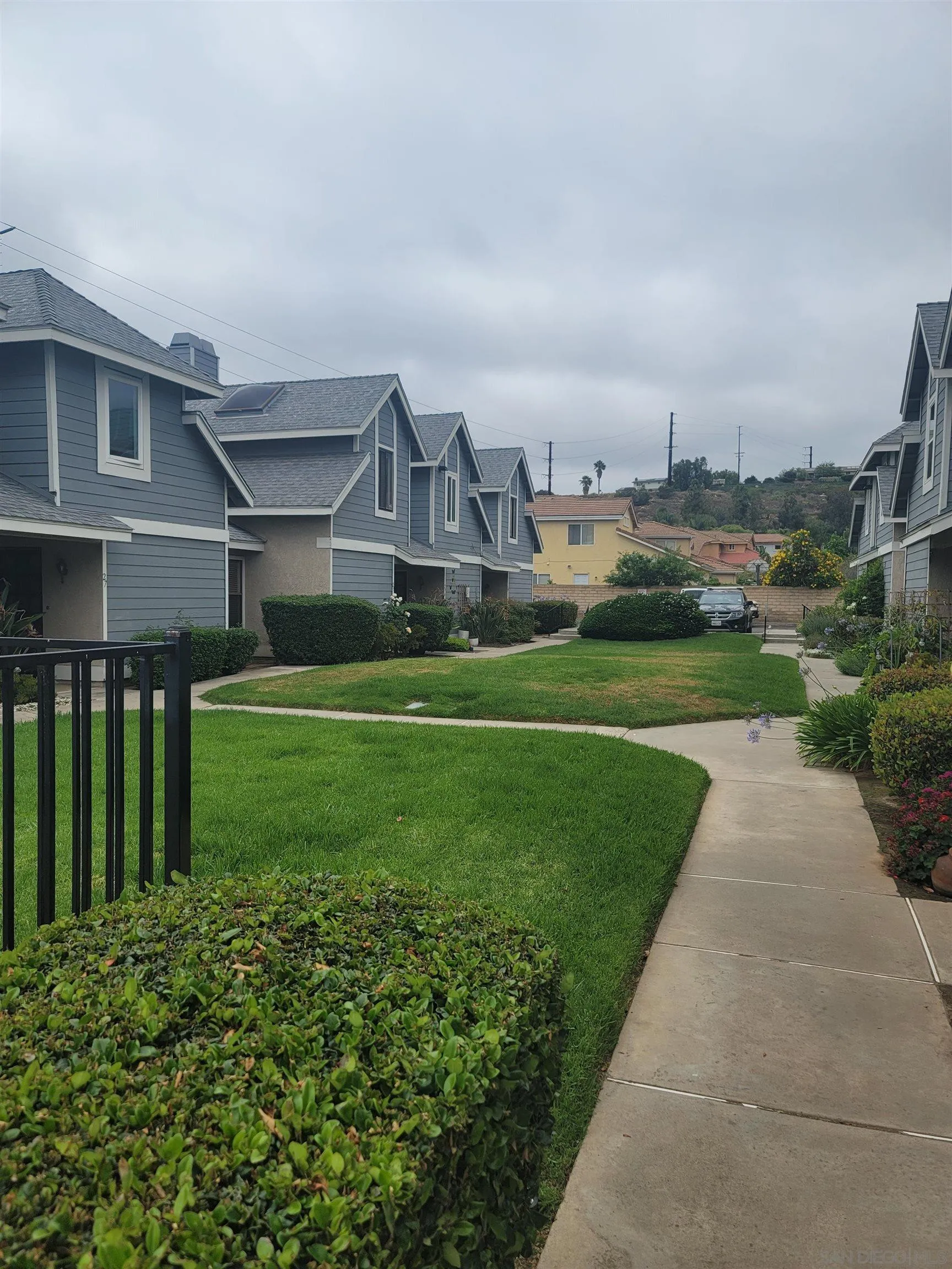 13230 Johannesberg Way, Unit 10 Poway, CA 92064 - Photo 40 of 40 a view of a garden with a house