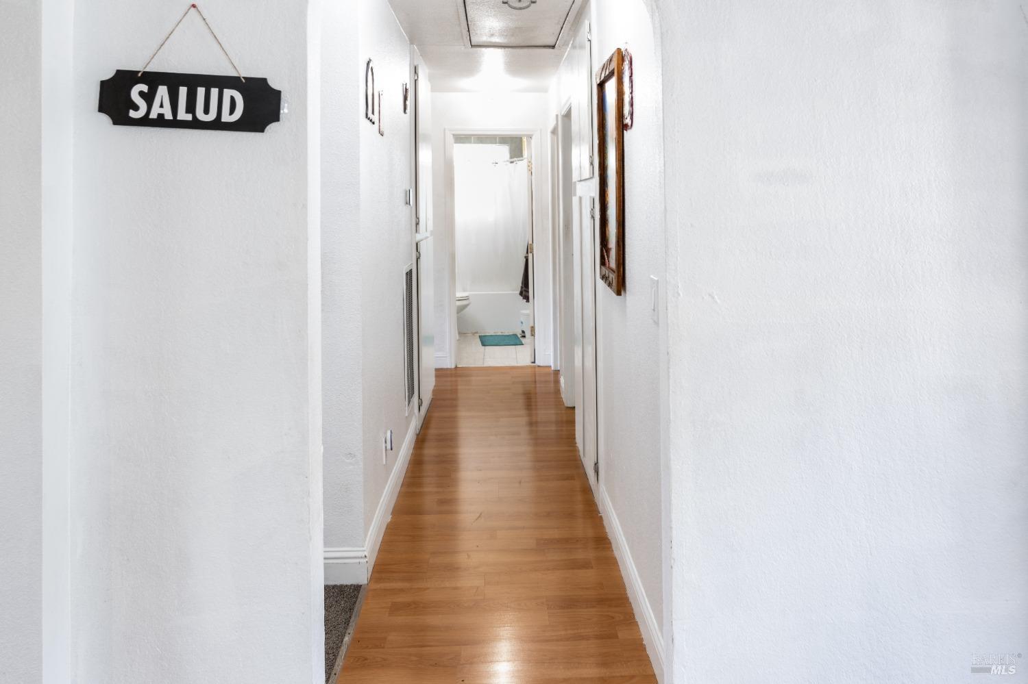 32 Boxelder Court Napa, CA 94558 - Photo 28 of 75 a view of a hallway with wooden floor